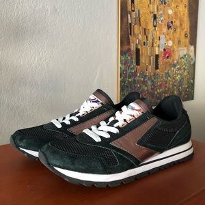 Brooks athletic shoes in black and rose gold